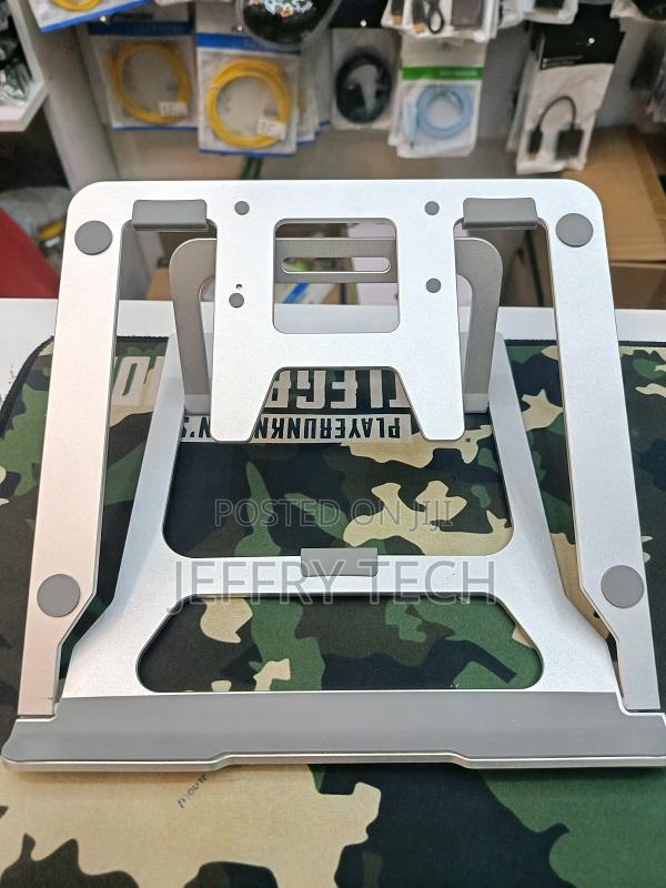 Adjustable Foldable Aluminum Stand Designed for Laptops and Tablets. - main view