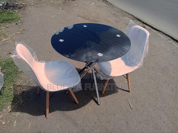 Black Coffee Table With Orange Eames Chair - main view
