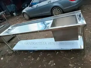 Stainless Steel Work Table With an Integrated Sink.