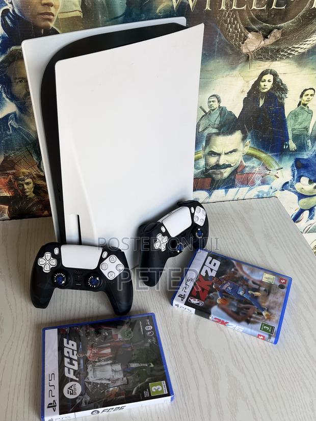 Clean Ex Uk Consoles Ps5 Stds, With 2 Pads and Fc26