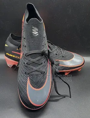 Nike Mercurial Vapor 12 Elite Soccer Cleats in a Black and Orange