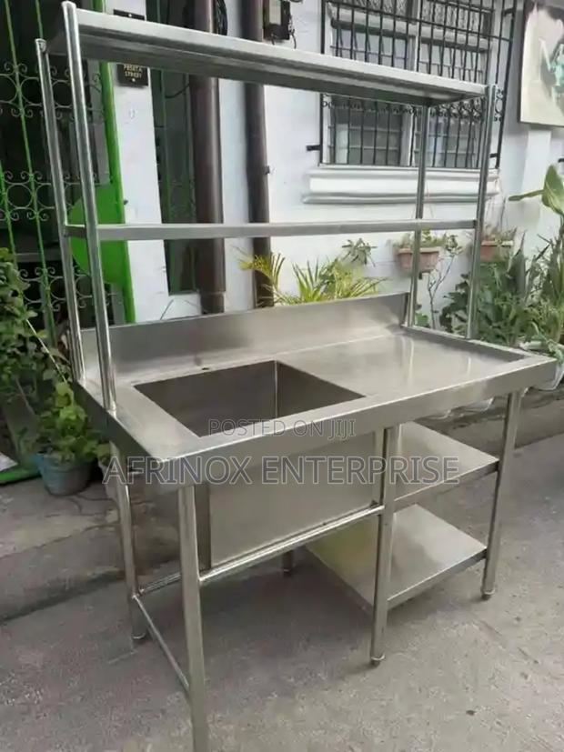 Stainless Steel Work Table With an Integrated Sink,
