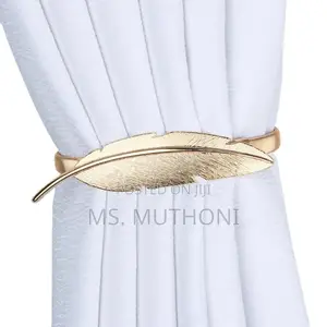 A Pair of Feather Shape Elastic, Metallic Curtain Buckles*