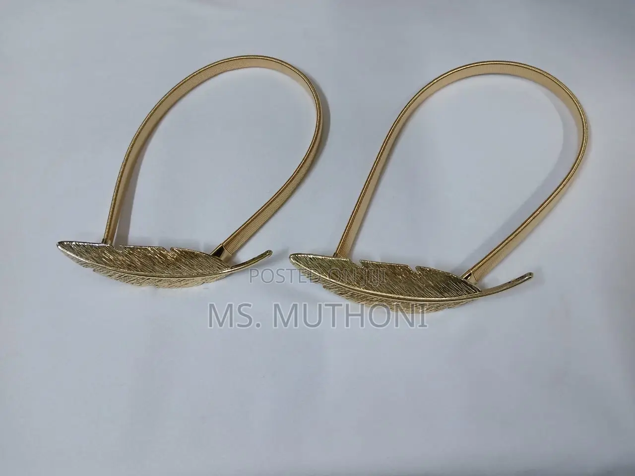 A Pair of Feather Shape Elastic, Metallic Curtain Buckles*