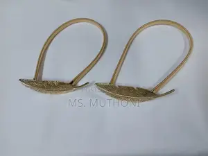 A Pair of Feather Shape Elastic, Metallic Curtain Buckles*
