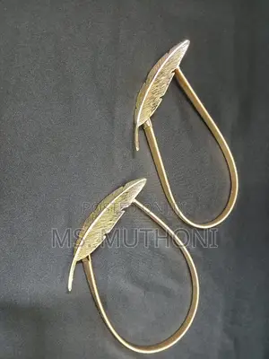 A Pair of Feather Shape Elastic, Metallic Curtain Buckles*