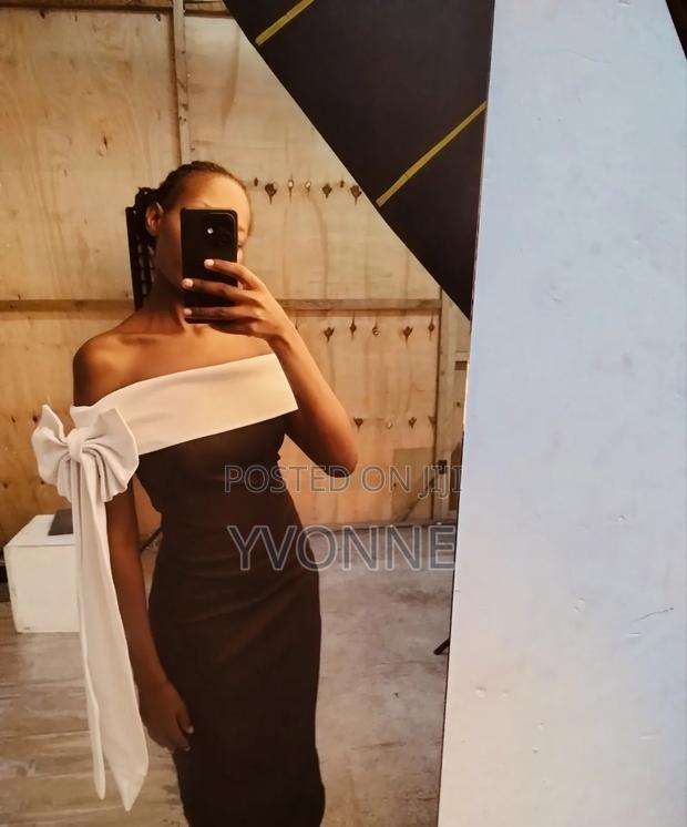 Fitted Dress With a Side Bow - main view