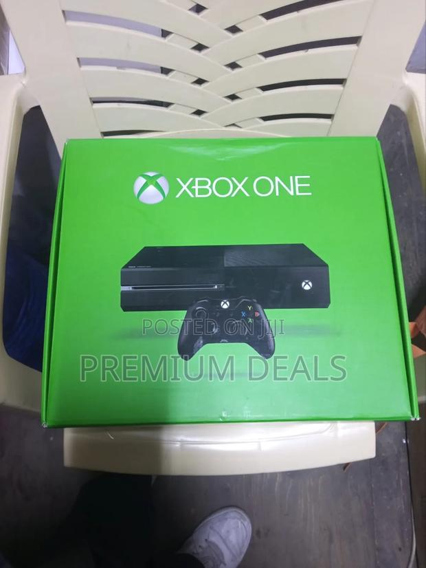 Xbox One With Games and One Controller.