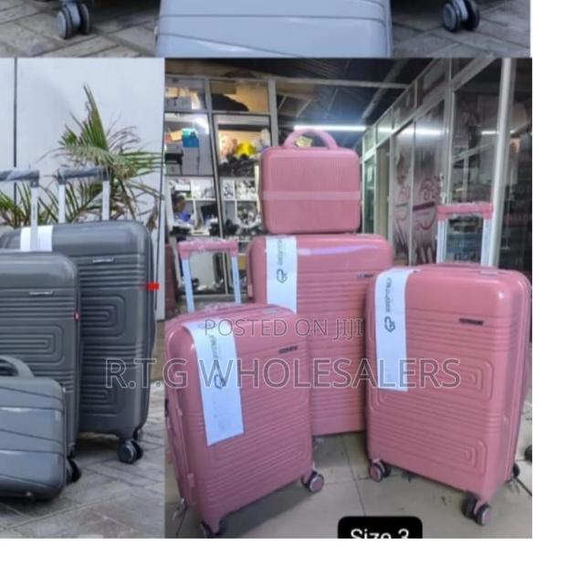 Unbreakable Medium Rubber Suitcase – Durable Travel Gear - thumbnail 2