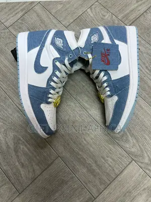 The Nike Air Jordan 1 Retro High Og 'denim' Unisex Sneaker.