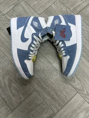 The Nike Air Jordan 1 Retro High Og 'denim' Unisex Sneaker.