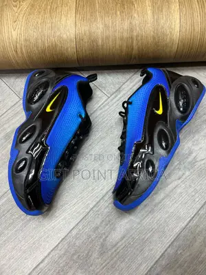 Nike Nocta Glide Sneakers