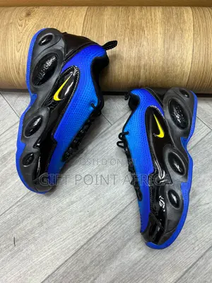 Nike Nocta Glide Sneakers
