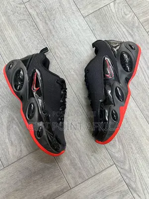 Nike Nocta Glide Sneakers