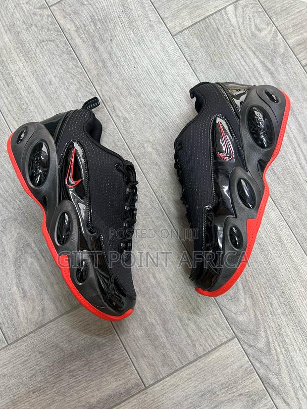 Nike Nocta Glide Sneakers