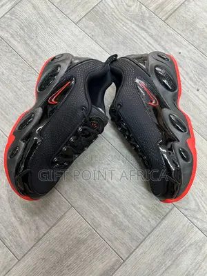 Nike Nocta Glide Sneakers
