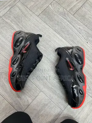 Nike Nocta Glide Sneakers