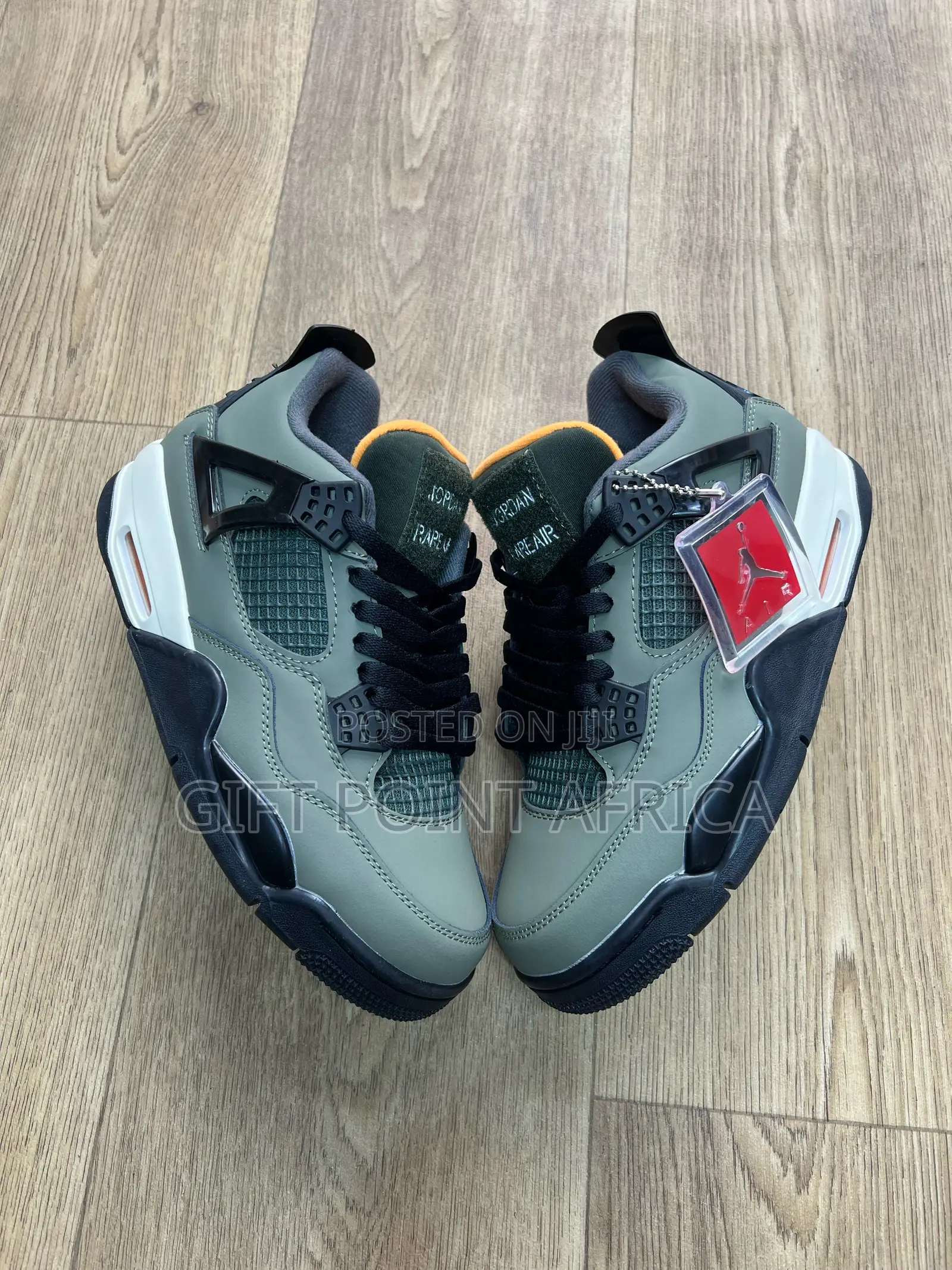 Jordan X Undefeated 4 Retro Sneakers.