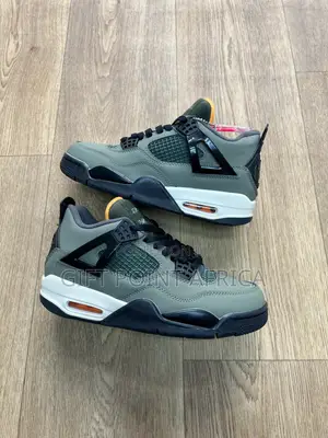 Jordan X Undefeated 4 Retro Sneakers.