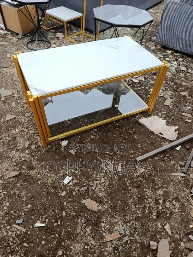White Toped and Glass Top Nesting Table for Sale