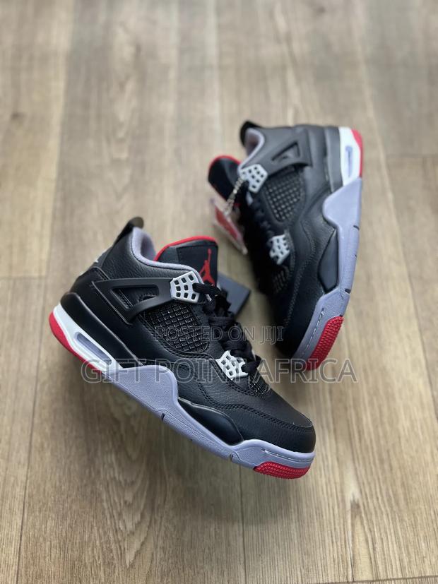 Nike Air Jordan 4 Retro Bred Reimagined Sneakers.