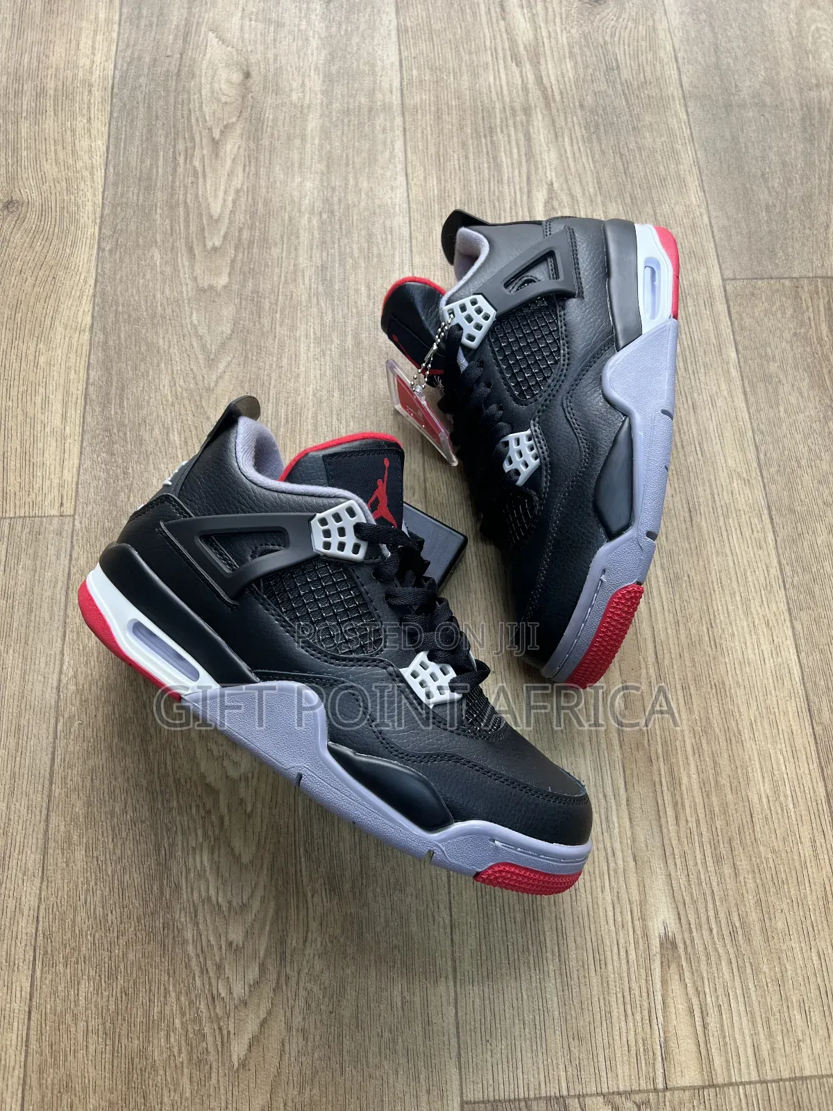 Nike Air Jordan 4 Retro Bred Reimagined Sneakers.