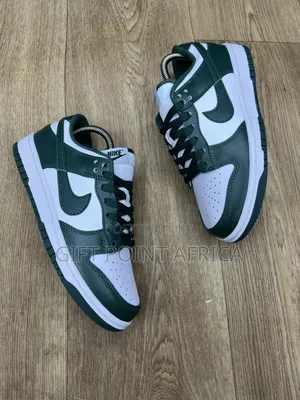 Nike Dunk Low Sneakers In The "Team Green" Or "Varsity Green"