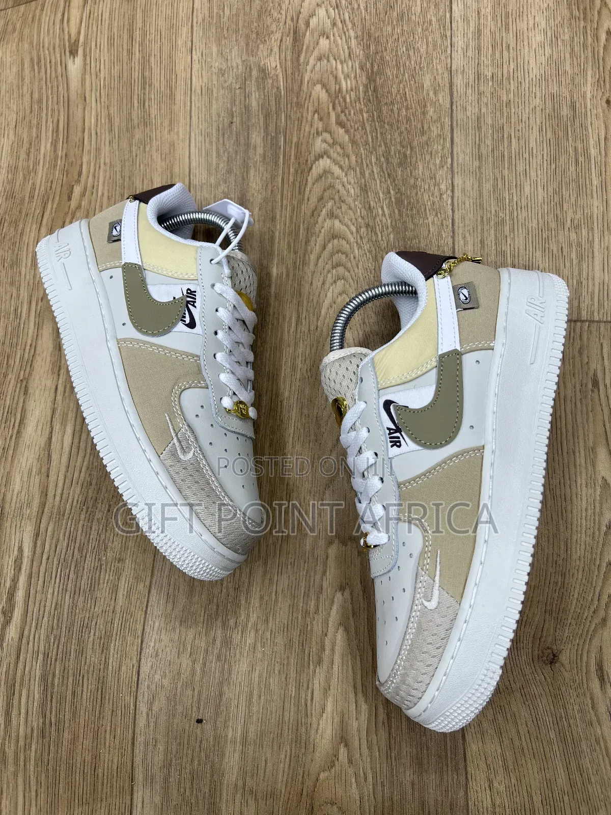 Nike Air Force 1 Low "Tan Bling" Model.