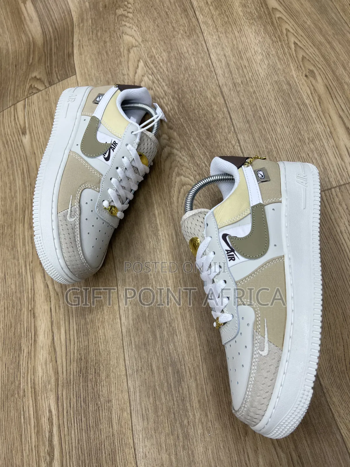 Nike Air Force 1 Low "Tan Bling" Model.