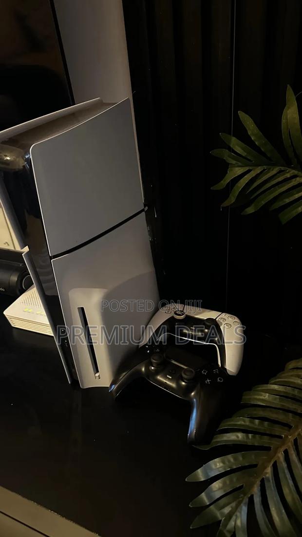 Uk  Owned Ps5 Slim With Two Controllers.