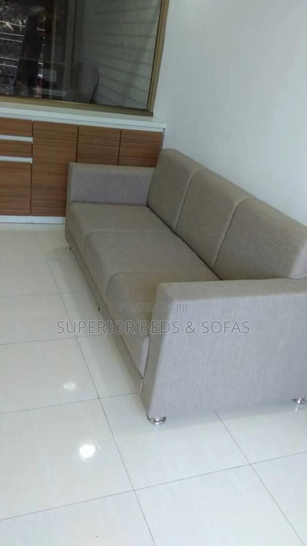 Beige Fabric Three-Seater Sofa