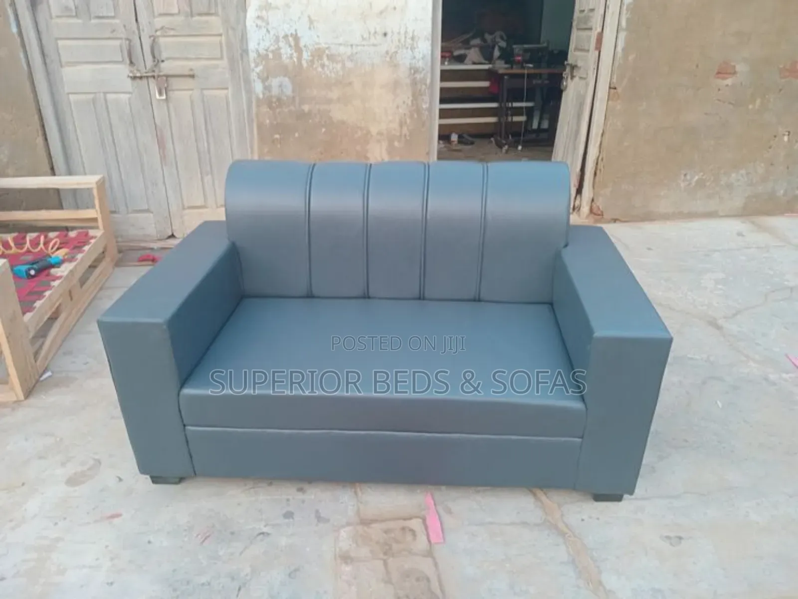 Blue Leather Two-Seater Sofa