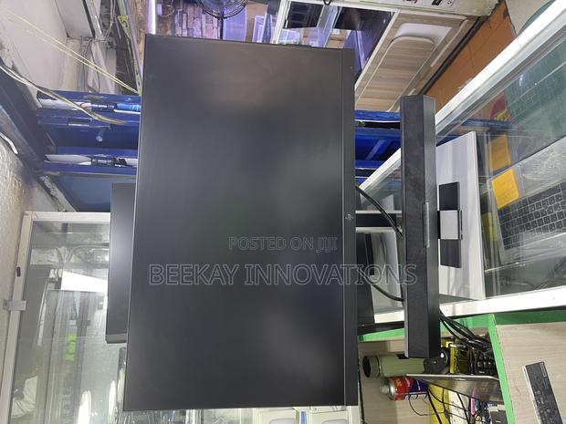 Hp 24” Monitor With a Bluetooth Speaker - main view