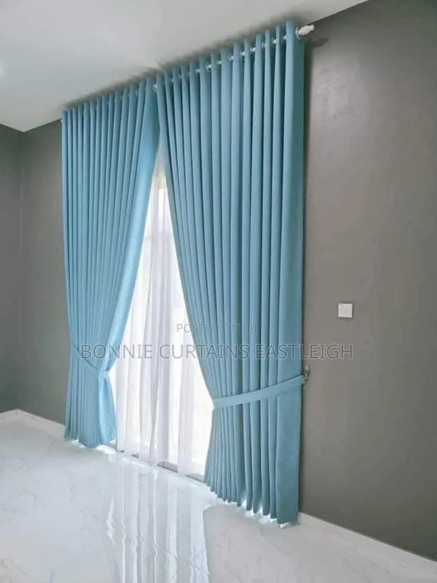 Sky Blue Curtains and White Sheers for Living Rooms
