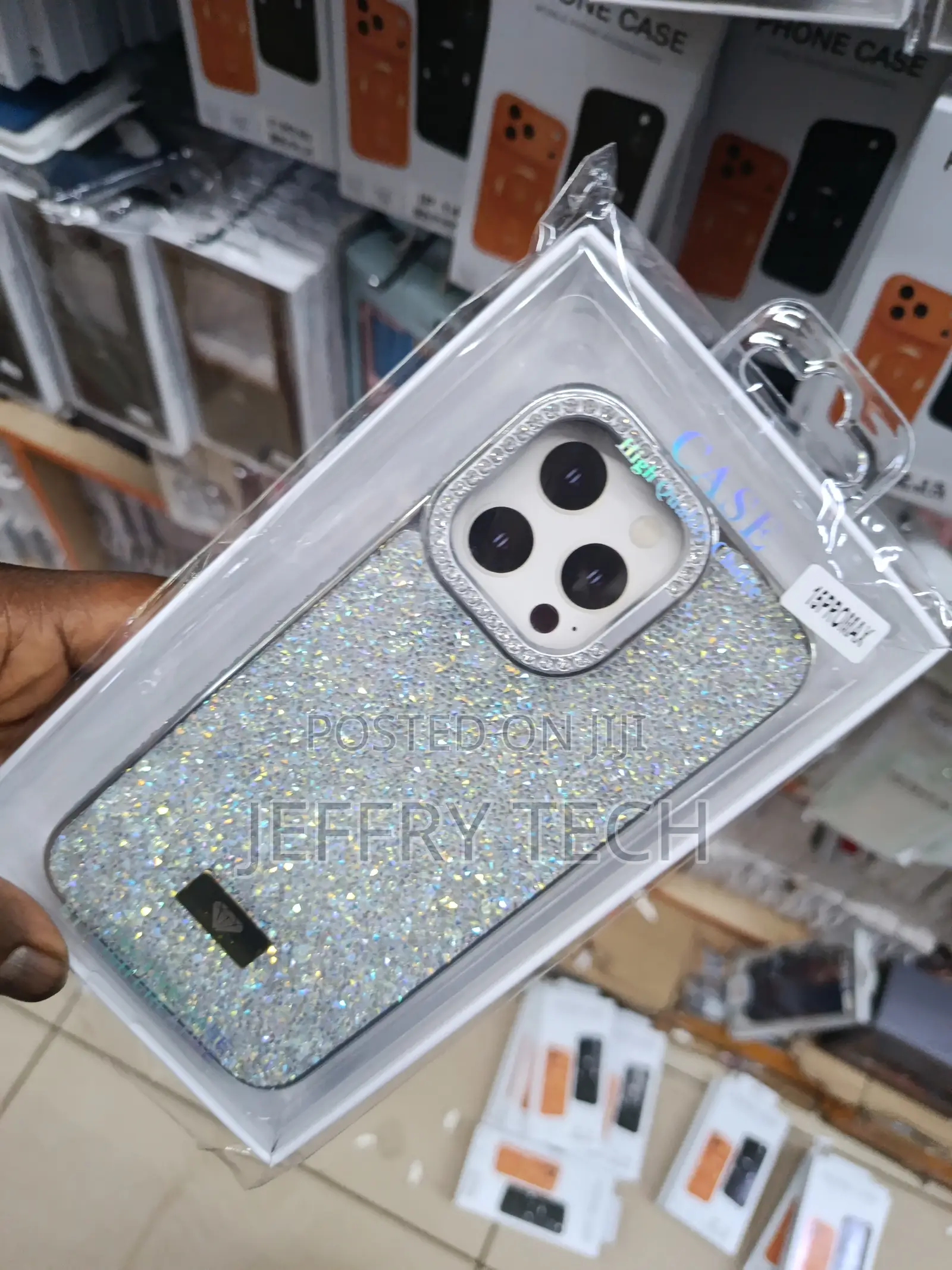 Sparkly, Rhinestone-Studded Phone Case the Apple iPhone 15 Pro Max.