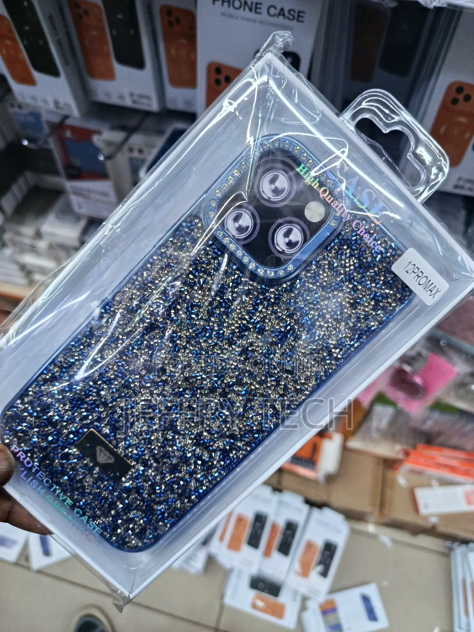 Blue Glittery Phone Case Is Designed to Fit the iPhone 12 Pro Max.