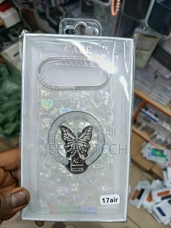 Phone Case for an iPhone 17 Air a Silver Butterfly Design and Glitter - main view