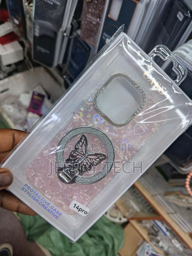 Pink Glittery Case With a Butterfly Kickstand for an iPhone 14 Pro. - thumbnail 3