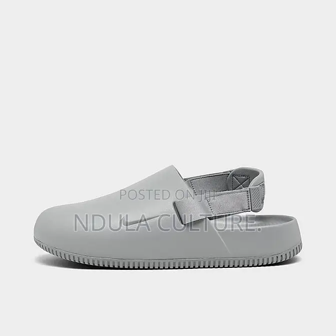 Nike Calm Mules and Slides