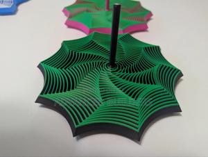 3d Printed Curved Multi-Colour Fidget Star - thumbnail 2