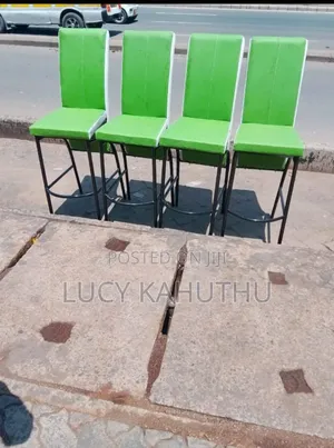 Green and White Executive Chairs With Black Durable Frame