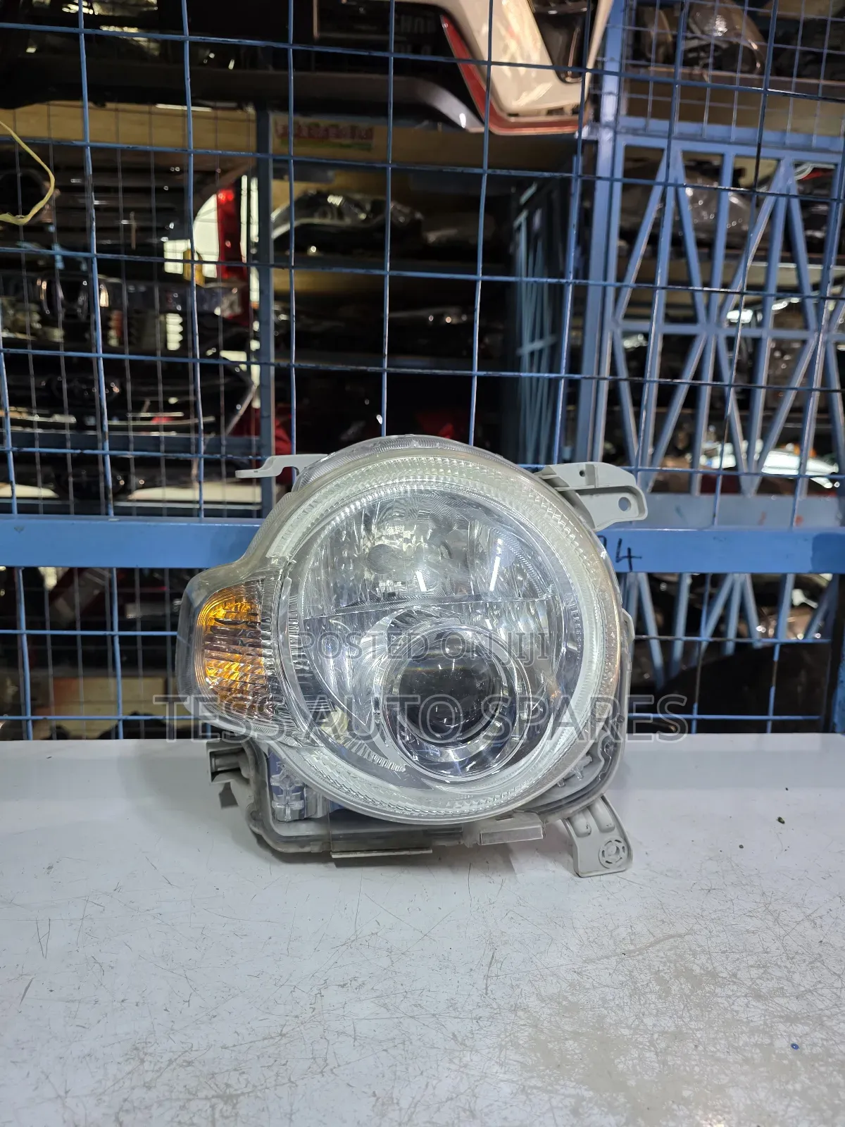 Daihatsu Cocoa Headlight