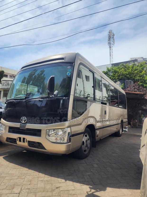 Toyota Coaster 2018 Gold