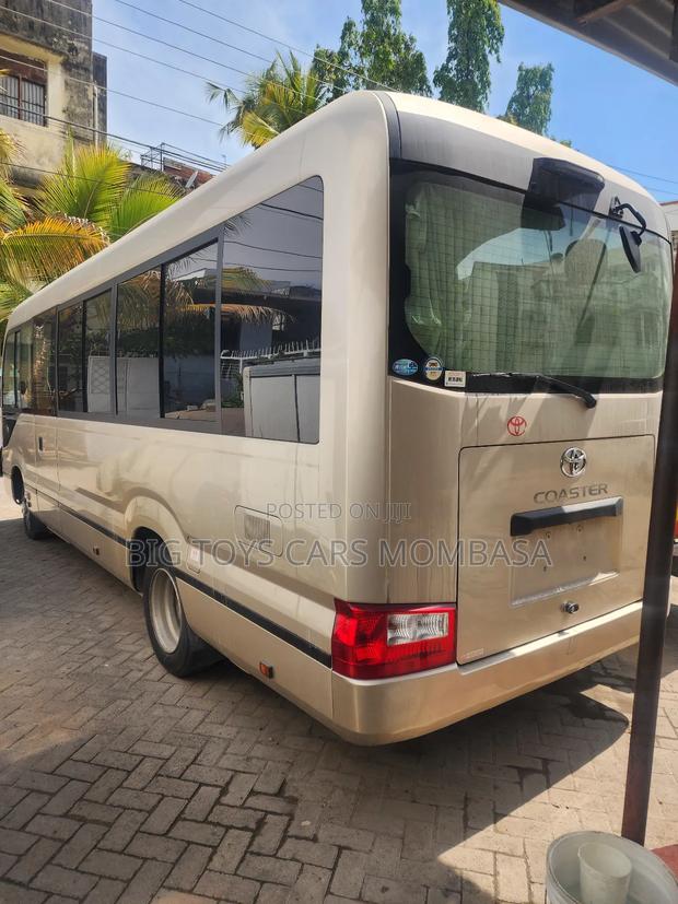 Toyota Coaster 2018 Gold - thumbnail 4