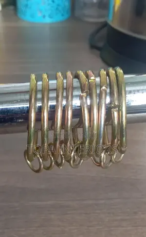 Gold Drapery Rings for Curtain Installation