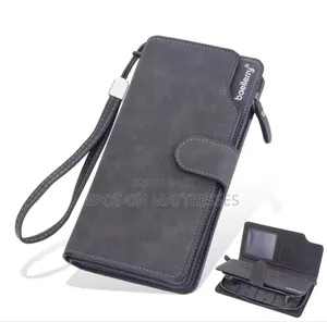 Ladies Baellery Clutch Bags. Available In Black, Blue, Brown And Grey.