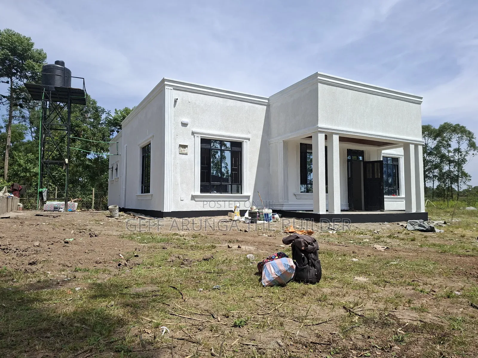 Construction of Modern Hidden Roofing 3 Bedroom House