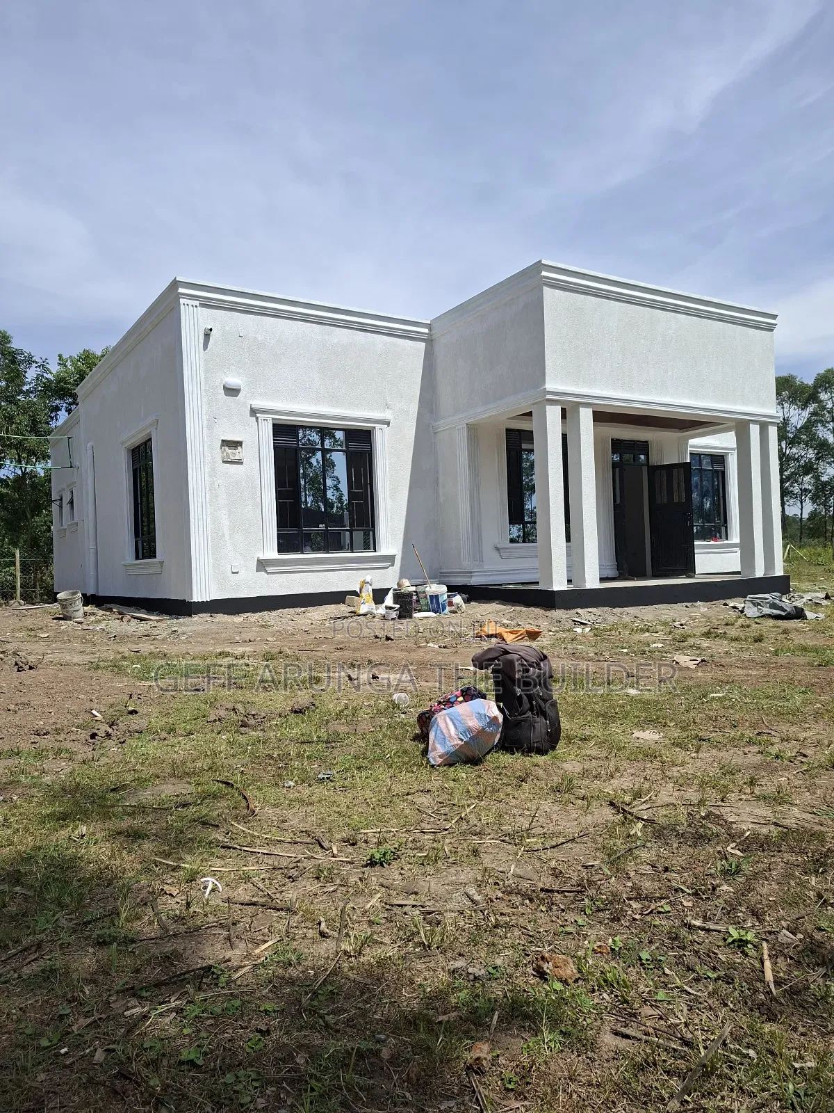 Construction of Modern Hidden Roofing 3 Bedroom House