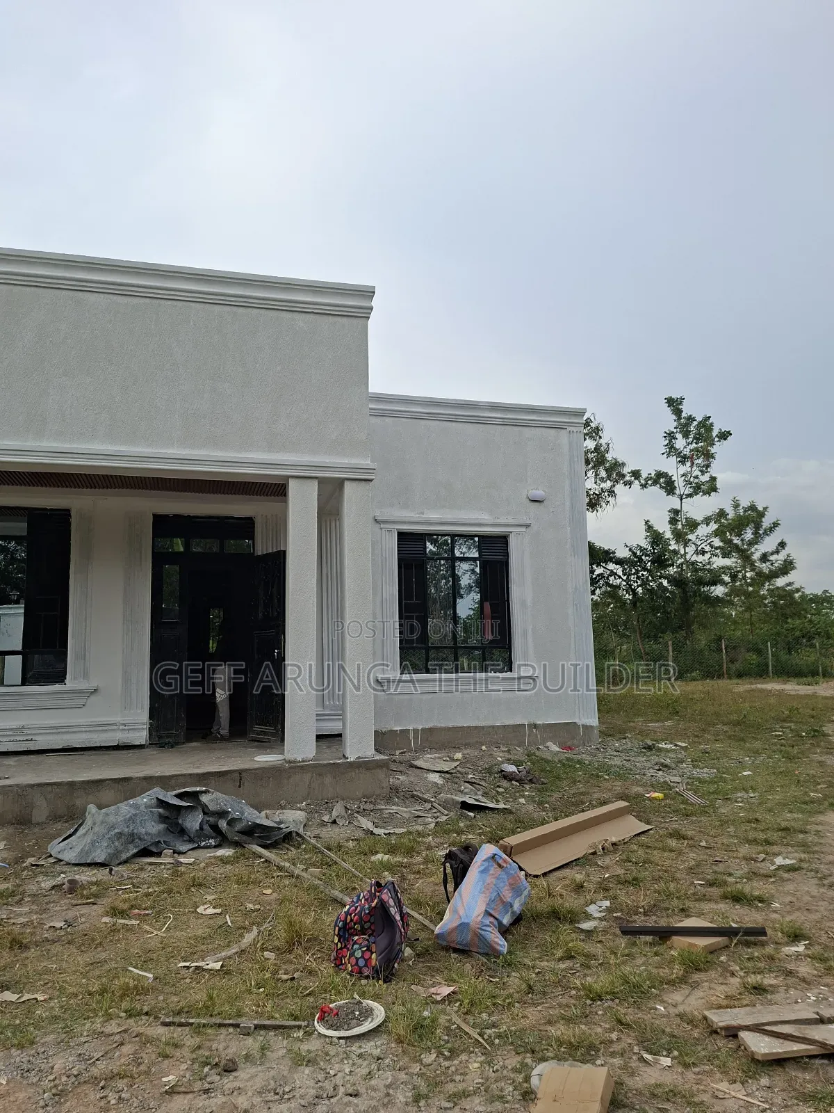 Construction of Modern Hidden Roofing 3 Bedroom House