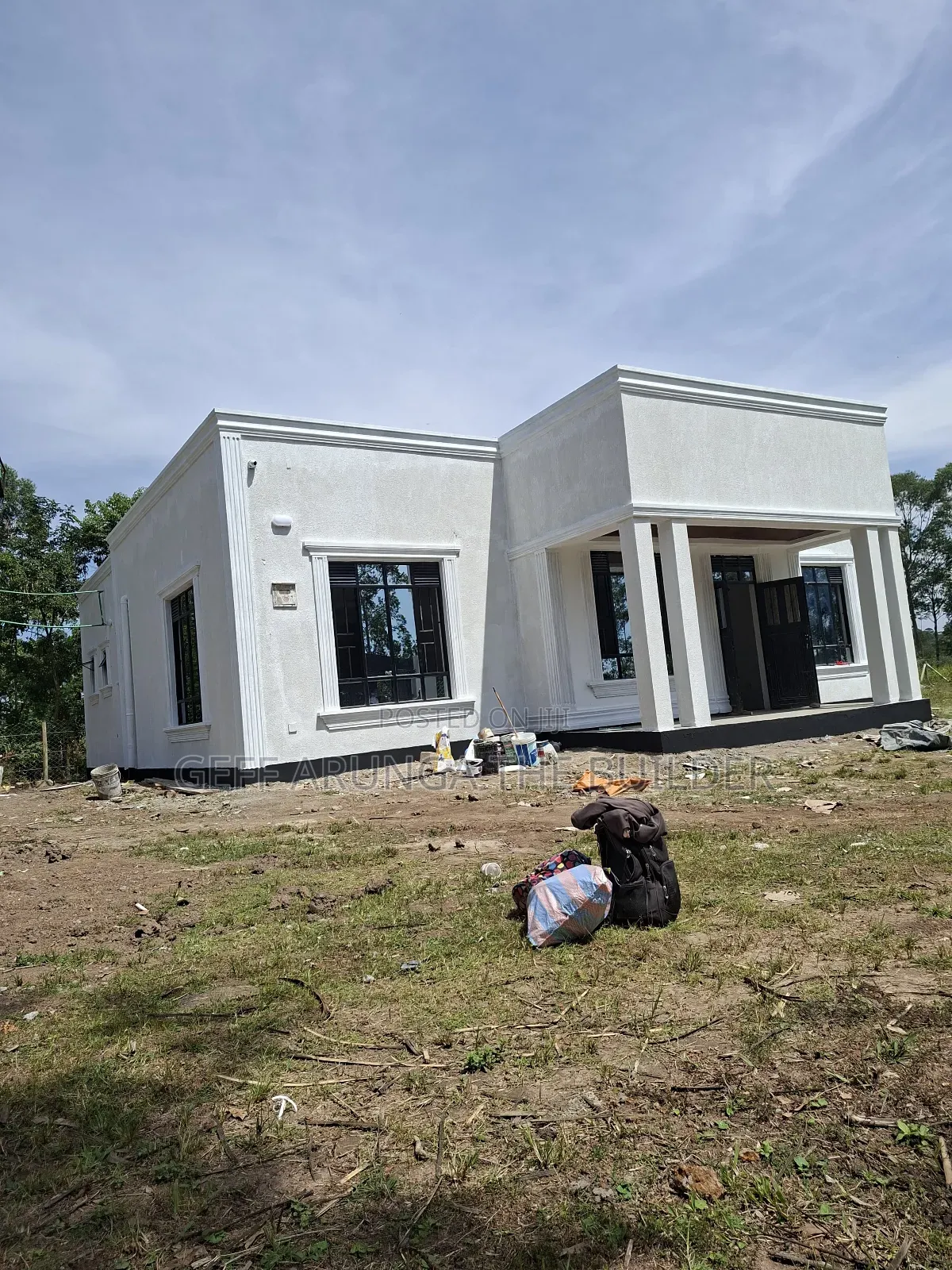 Construction of Modern Hidden Roofing 3 Bedroom House